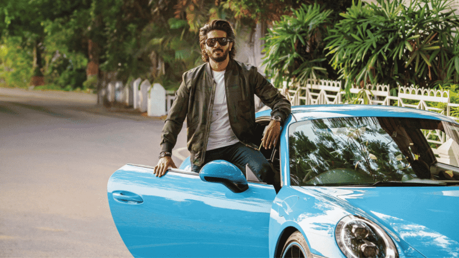 Dulquer Salmaan with Nissan car