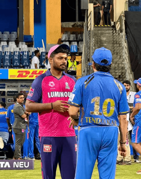 sachin tendulkar with sanju samson at an ipl match