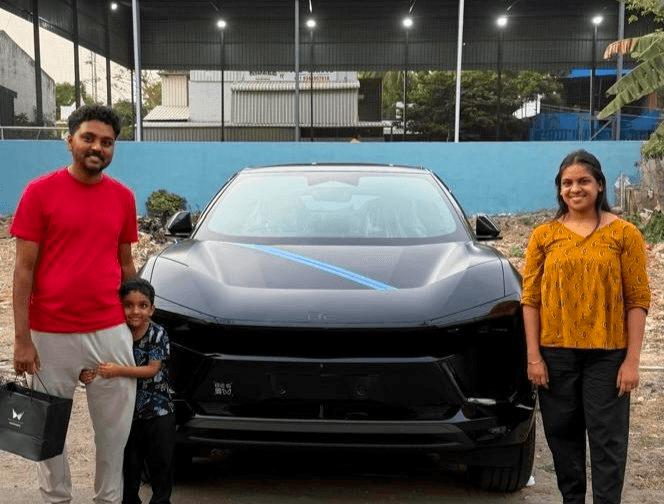 Kalaivanan R with car gifted by Suriya